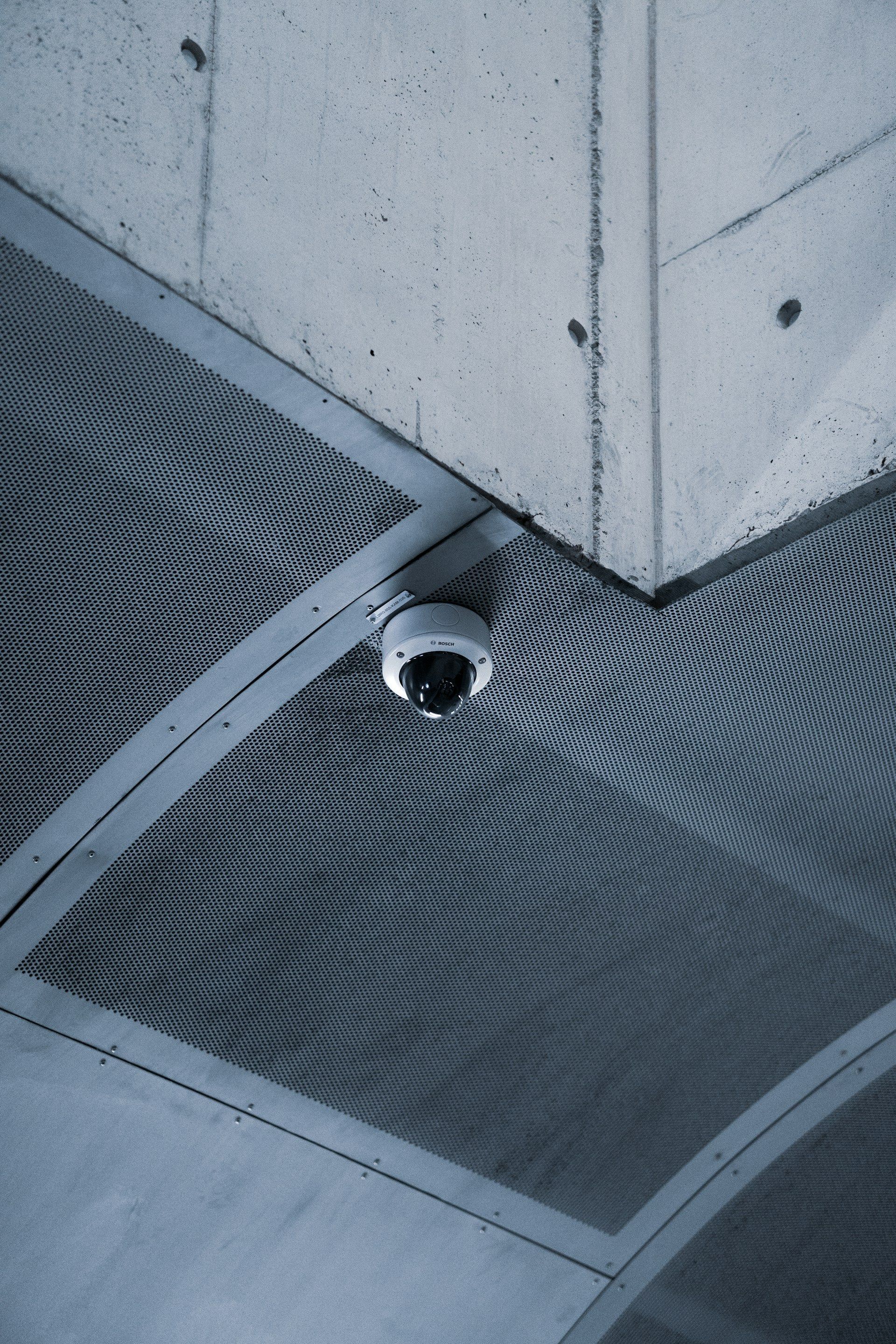 A white house with a porch and a chimney