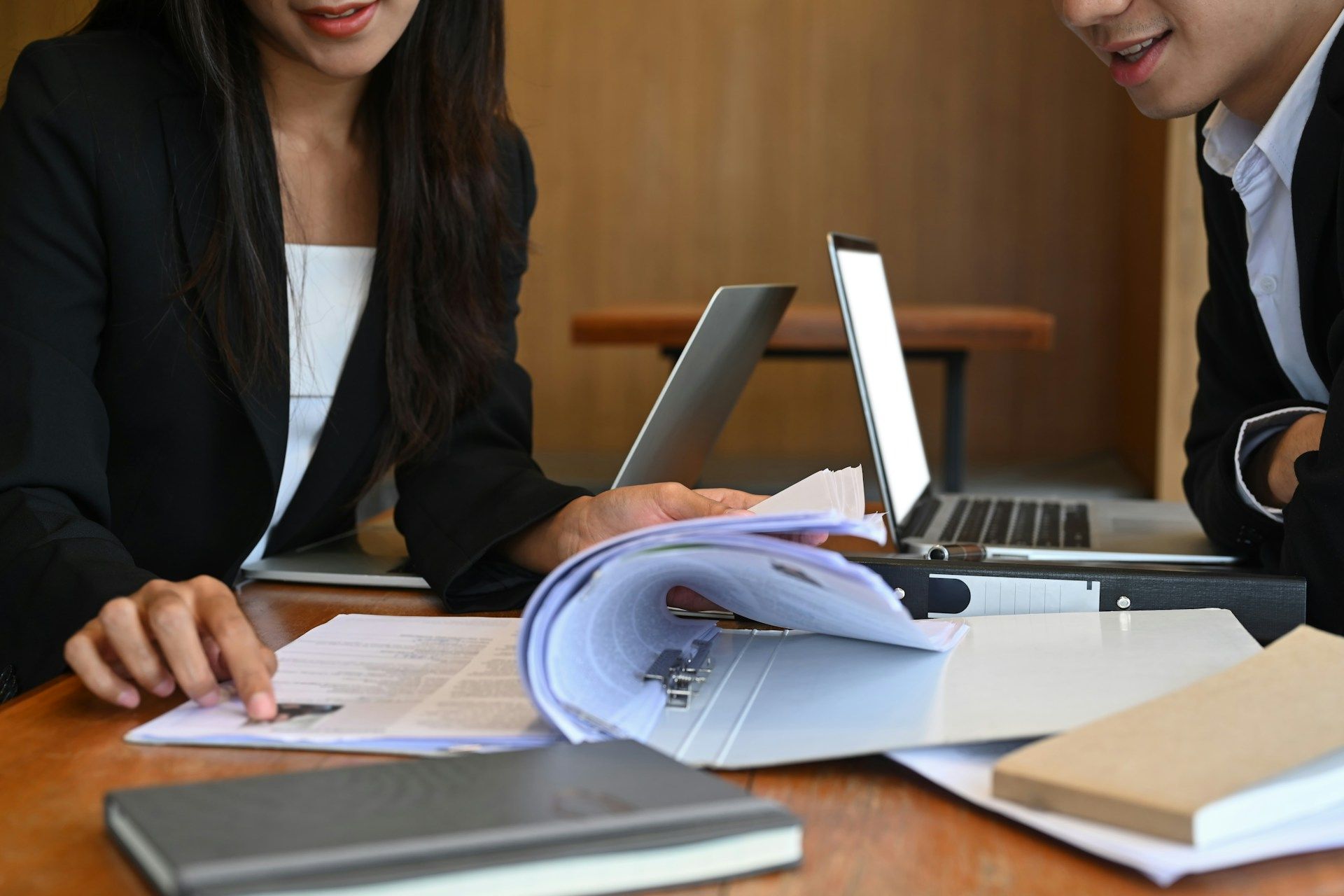 A white house with a porch and a chimney