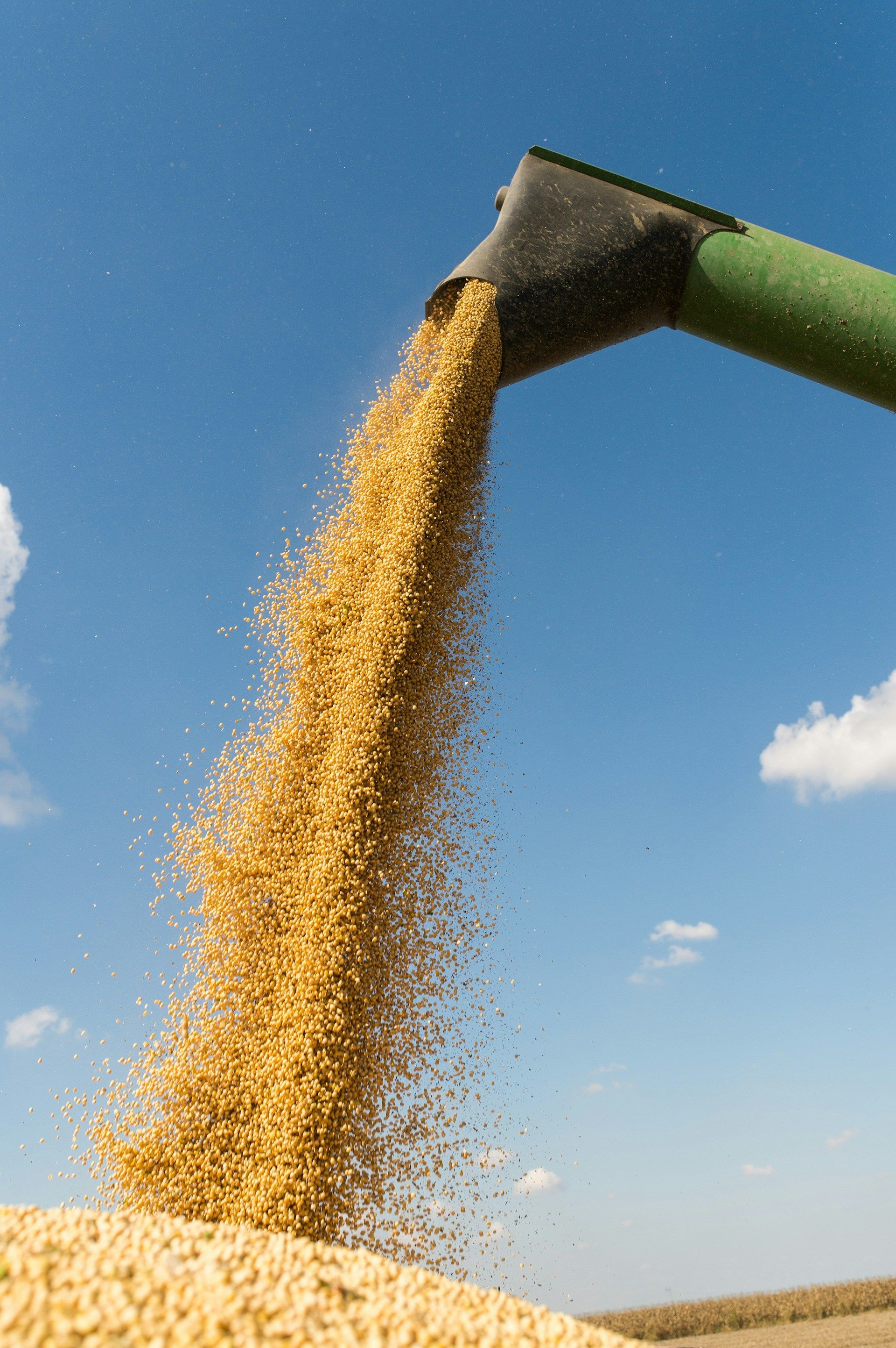 A white house with a porch and a chimney