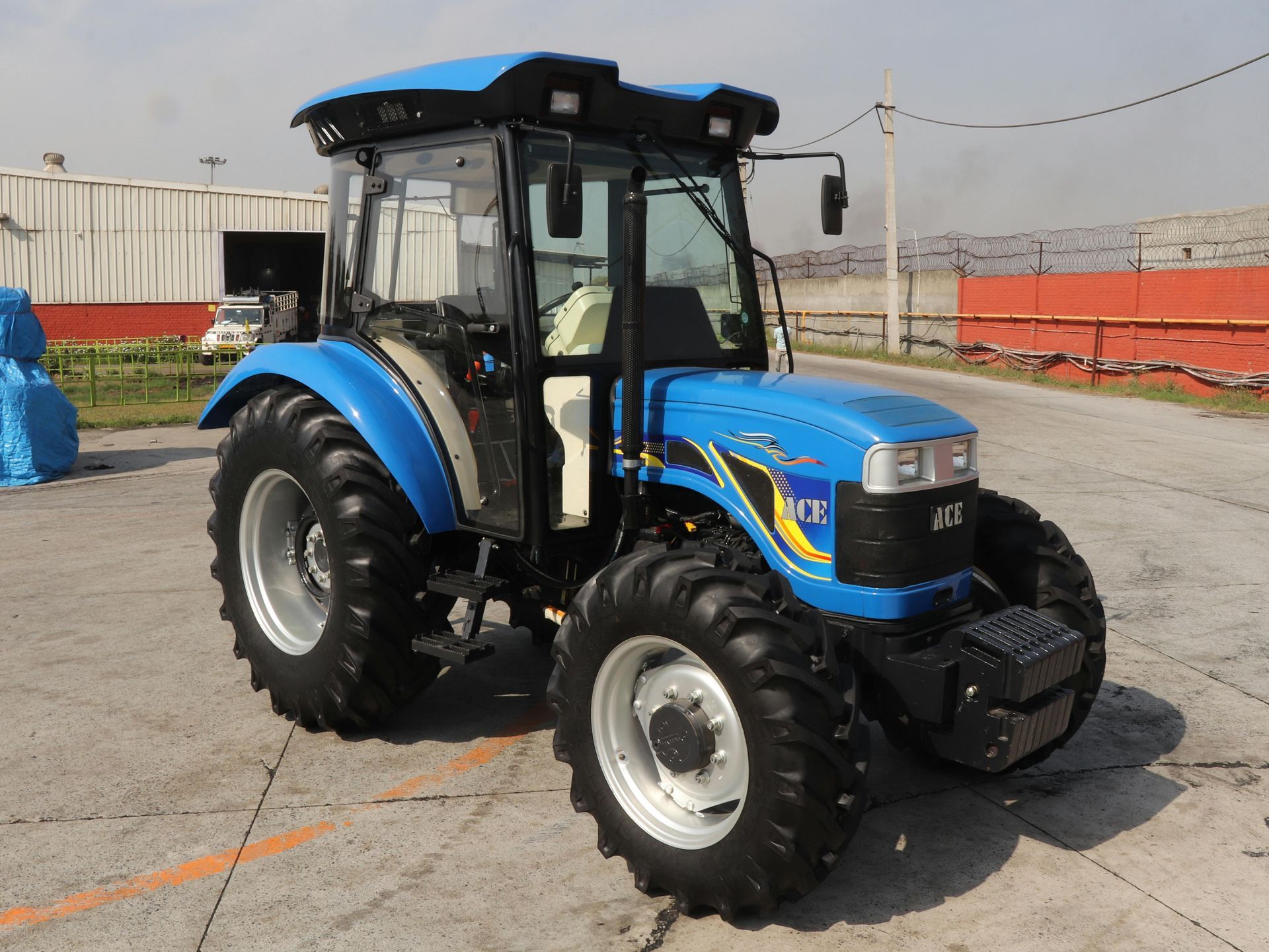A white house with a porch and a chimney
