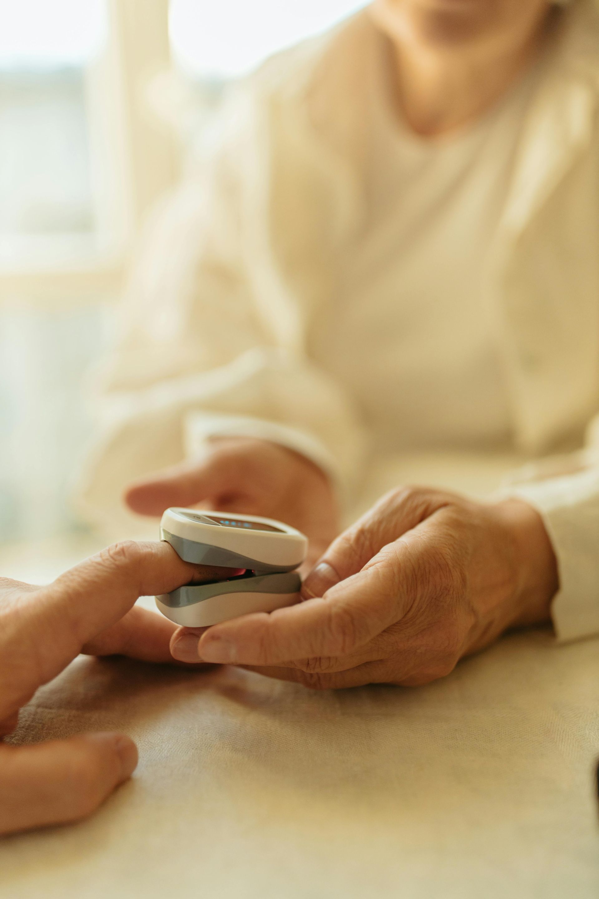 A white house with a porch and a chimney