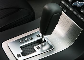 A close up of a shifter in a car