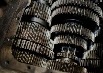 A close up of a bunch of gears in a machine.