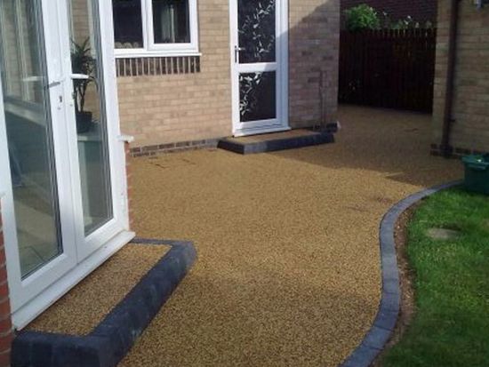 Driveways and Paving Nottingham buff resin patio and resin step and pathway from the patio doors