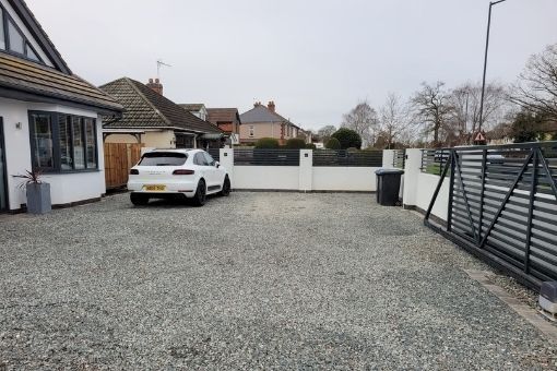 Driveways and Paving Nottingham gravel driveway  with parked car