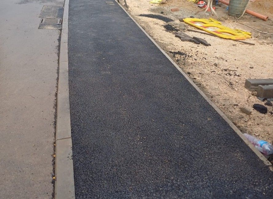 Driveways & Paving Nottingham completed drop kerb in Nottingham with new tarmac path