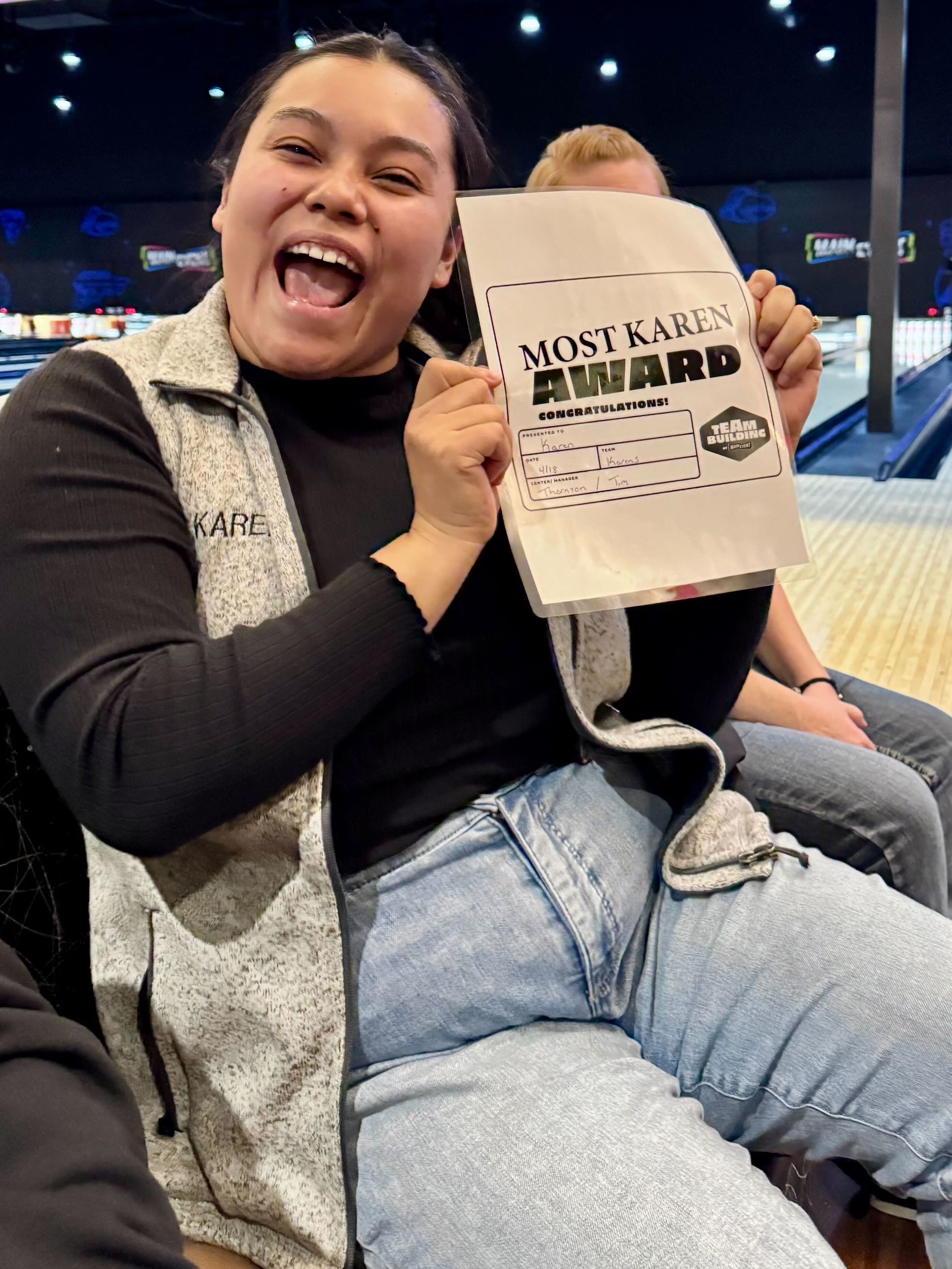 Woman excitedly holds 