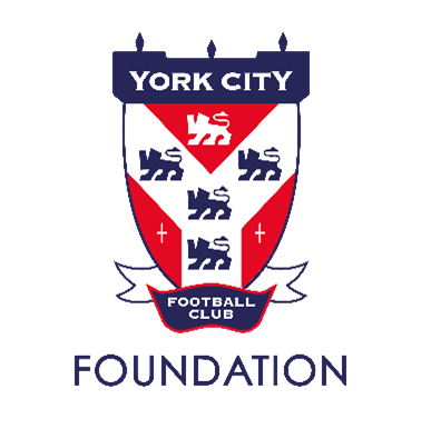 York City Football Club Foundation logo: shield with lions, red and blue, 