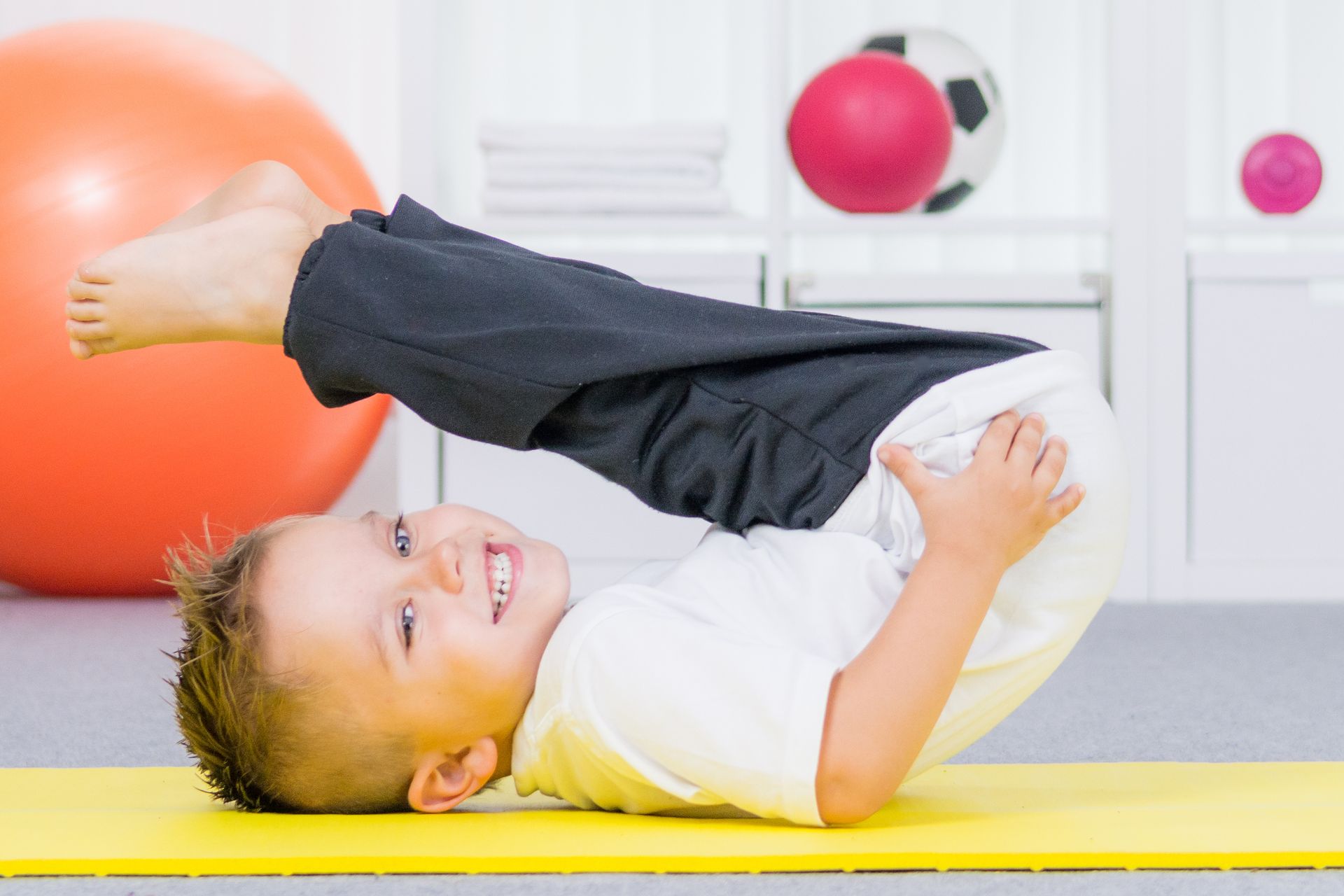 Child engaged in paediatric physiotherapy session