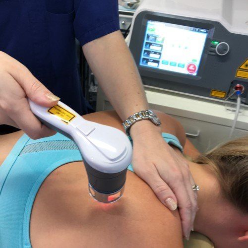laser therapy on persons back
