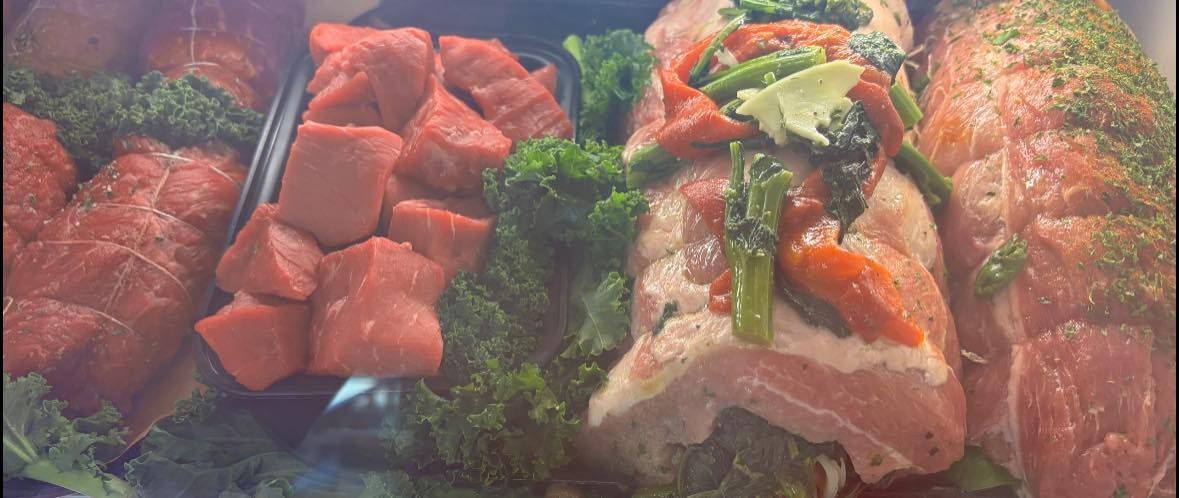 A close up of a plate of food with meat and vegetables.
