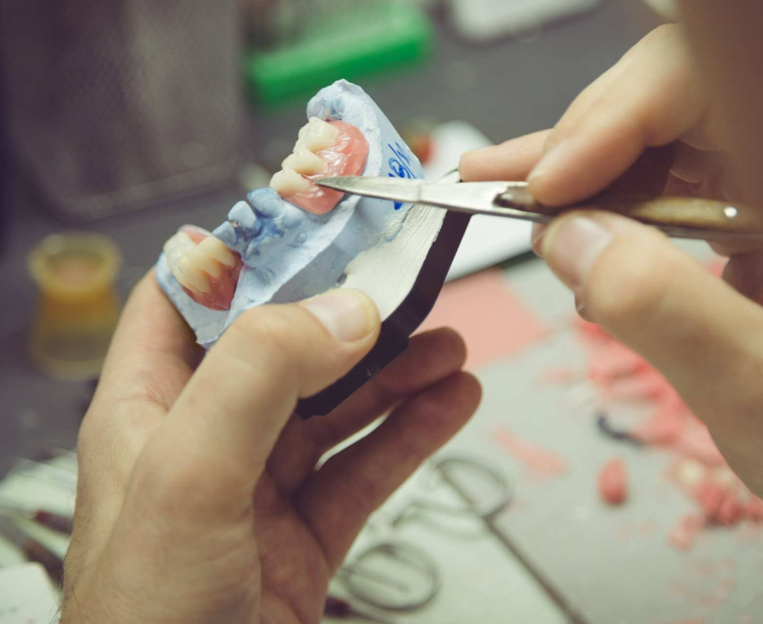 Man making a dental prosthesis | Ringwood, VIC | Abstract Arch Denture Clinic