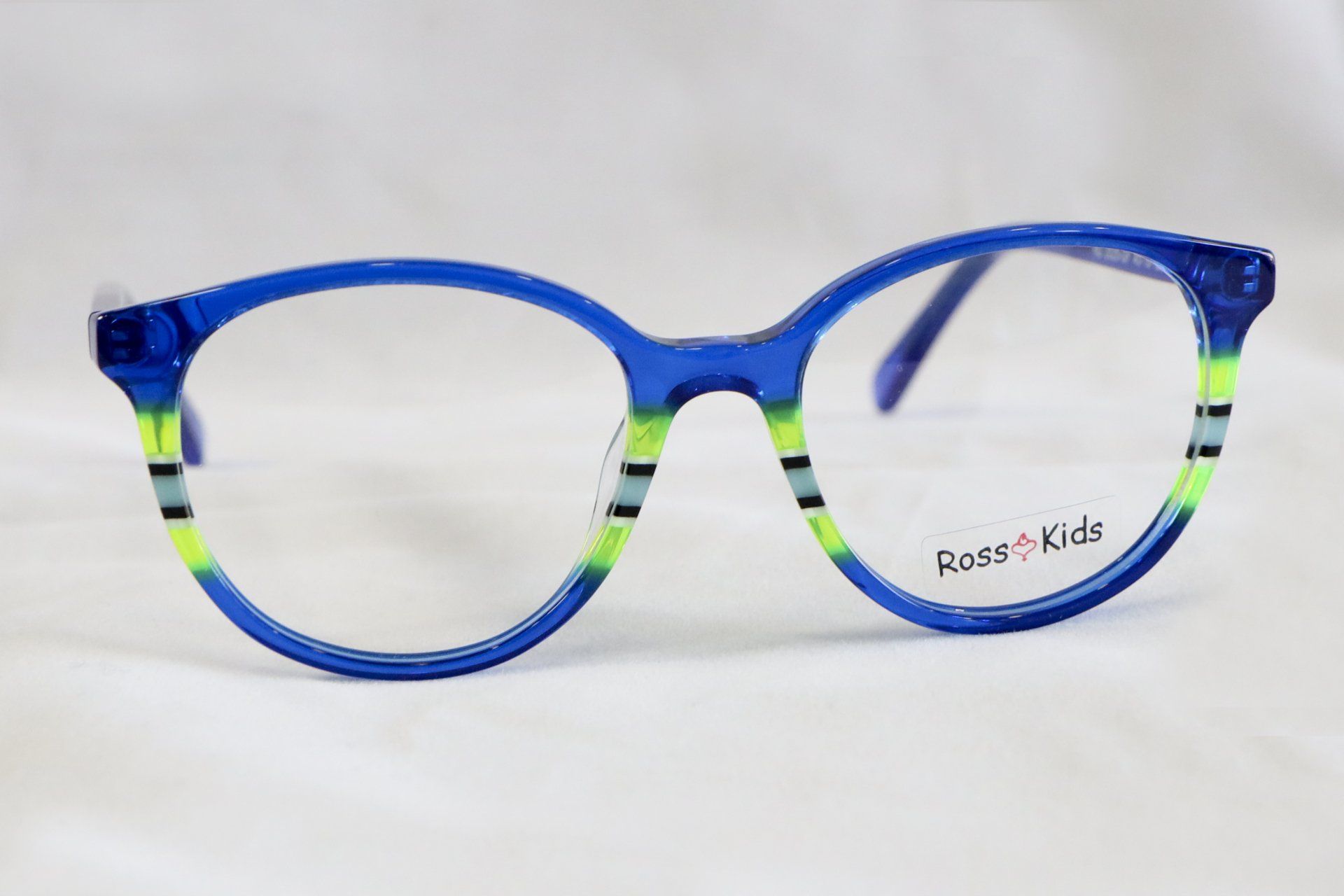 Occhiali da vista blu con dettagli a strisce verdi e nere, per bambini.