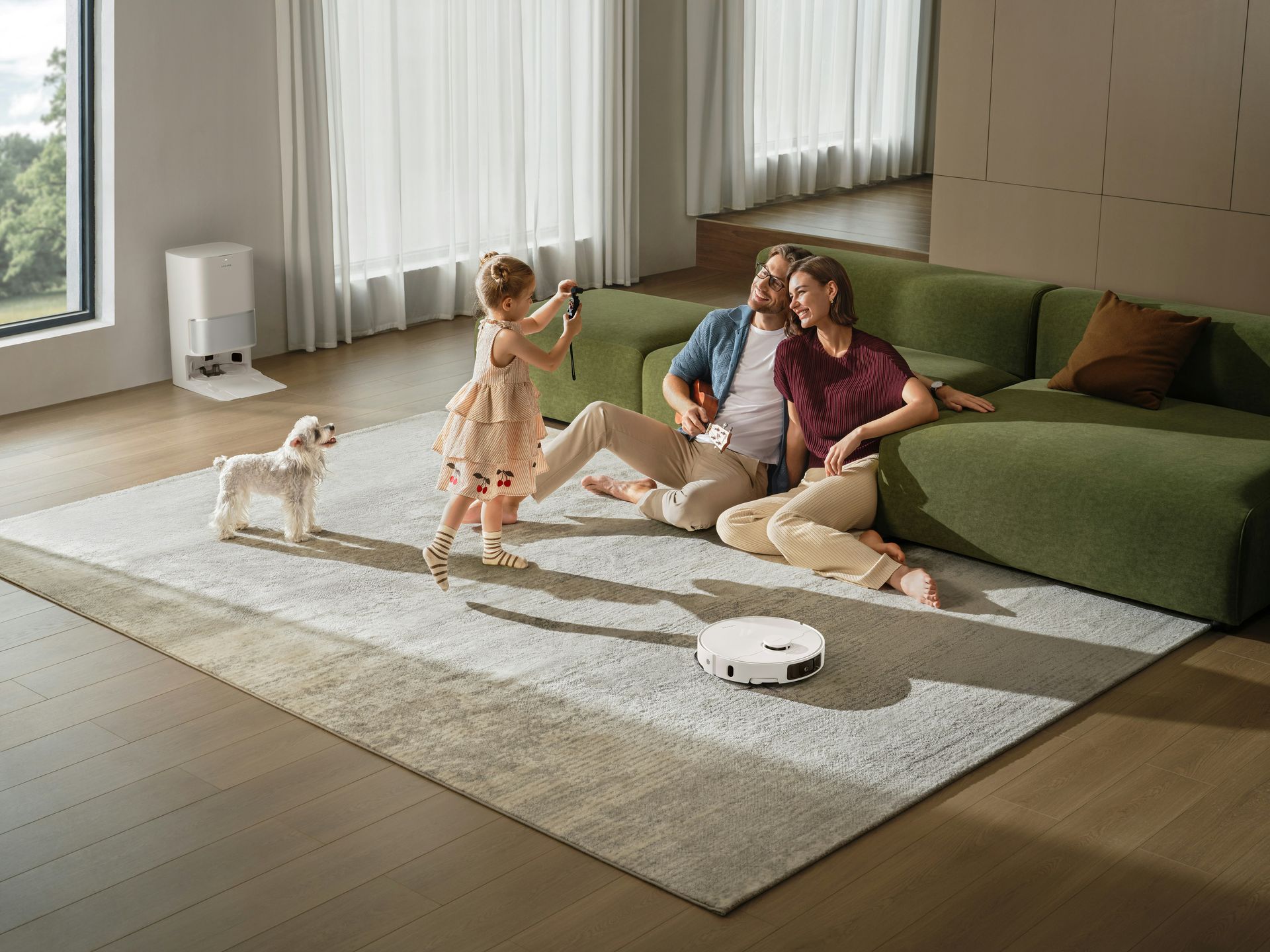 Family and pet watch a robot vacuum clean the living room.