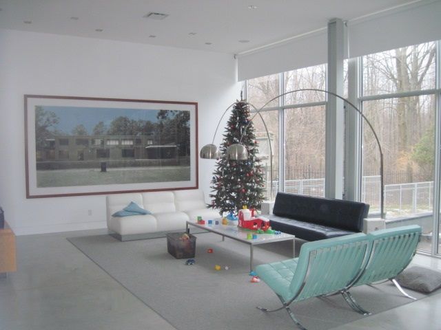 A living room filled with furniture and a christmas tree