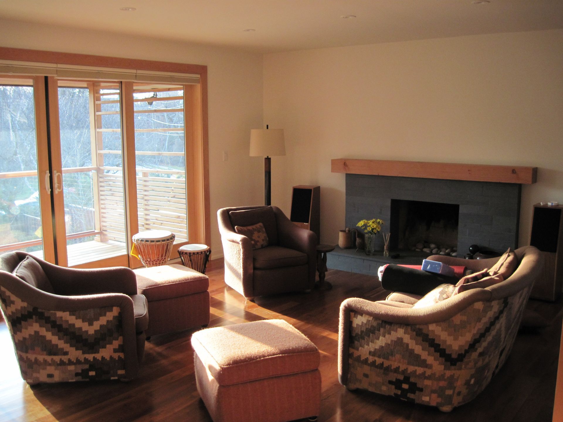 A living room filled with furniture and a fireplace
