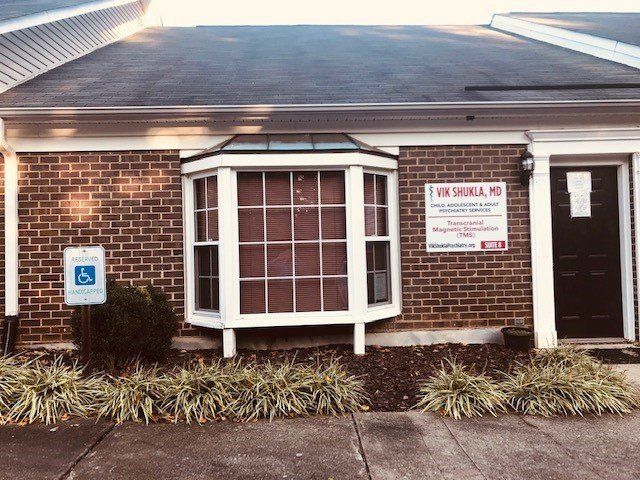 Senior Holding the Doctor's Hand — Gastonia, NC — Vik Shukla, M.D. Senior Holding the Doctor's Hand — Gastonia, NC — Vik Shukla, M.D.
