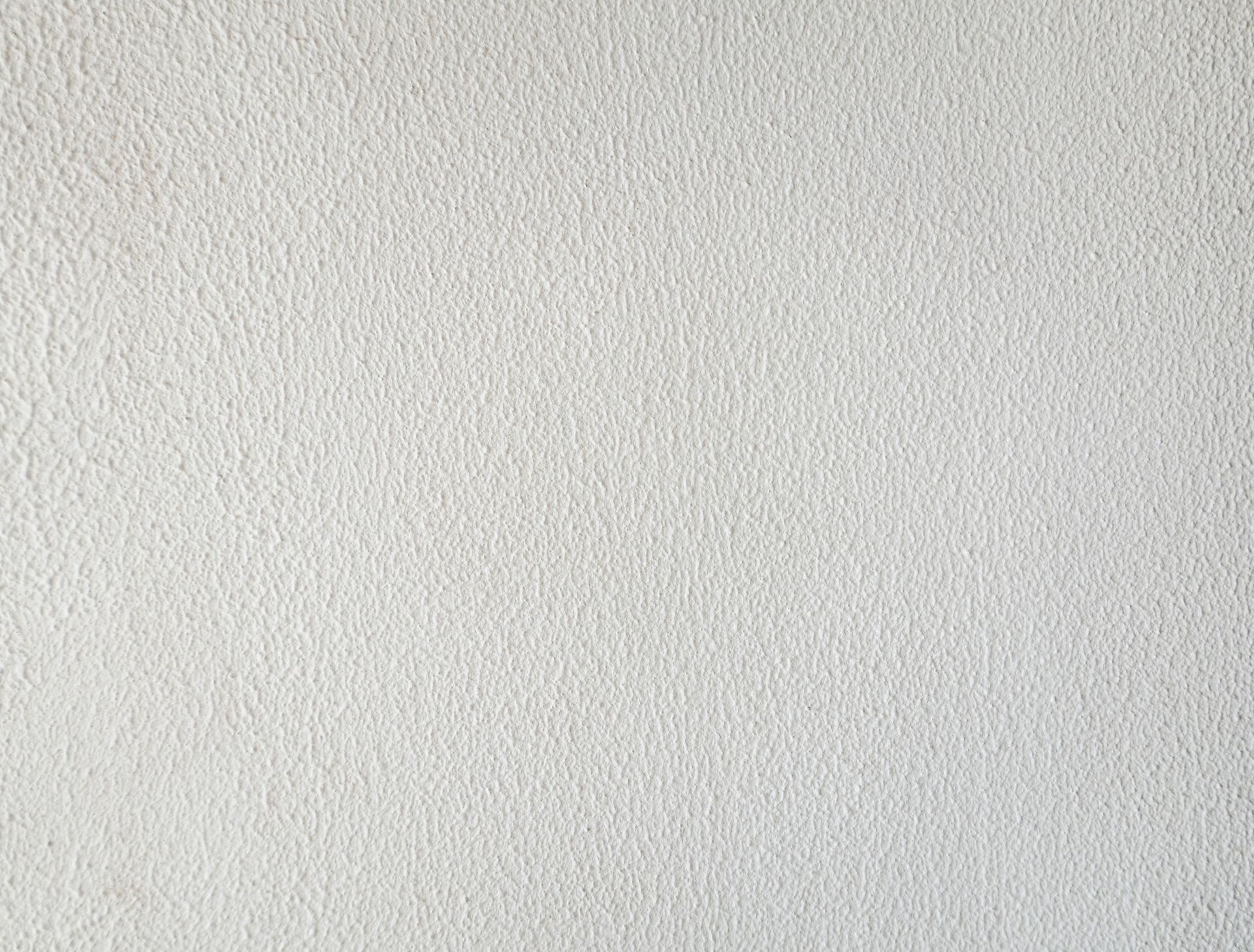 A close up of a white paper texture.