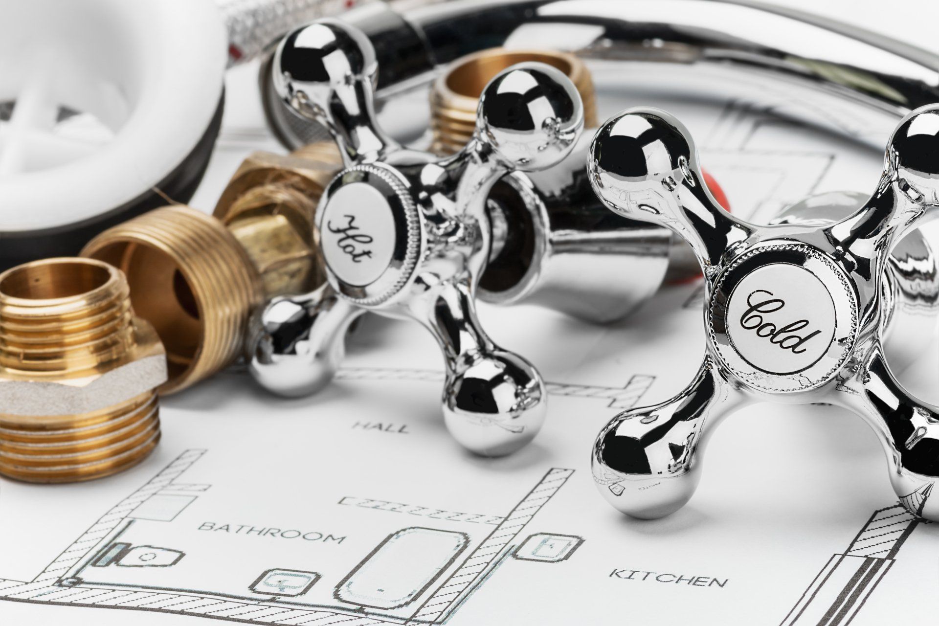 Plumbing And Tools Lying On Drawing For Repair - Manitowoc, WI - Manitowoc Plumbing Service Inc.