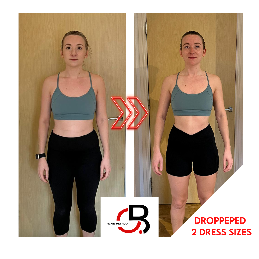 A woman is standing in front of a door wearing a crop top and shorts.