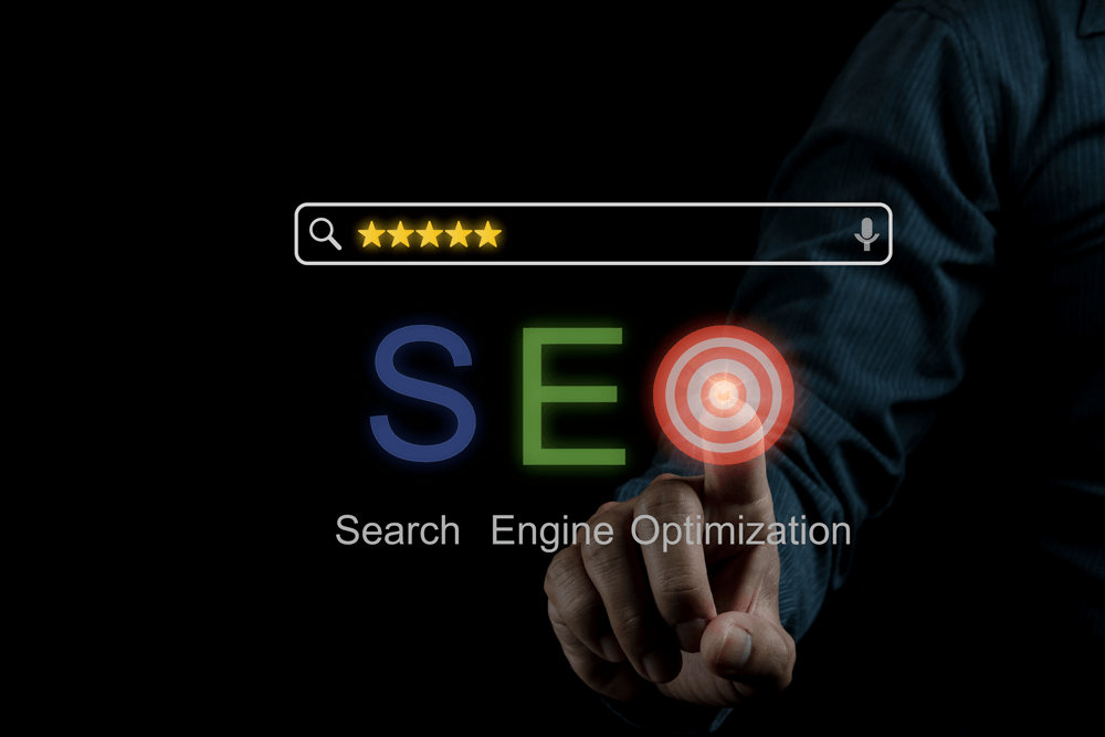 Search Engine Optimization with a hand and search bar