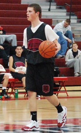 A basketball player with the number 10 on his jersey