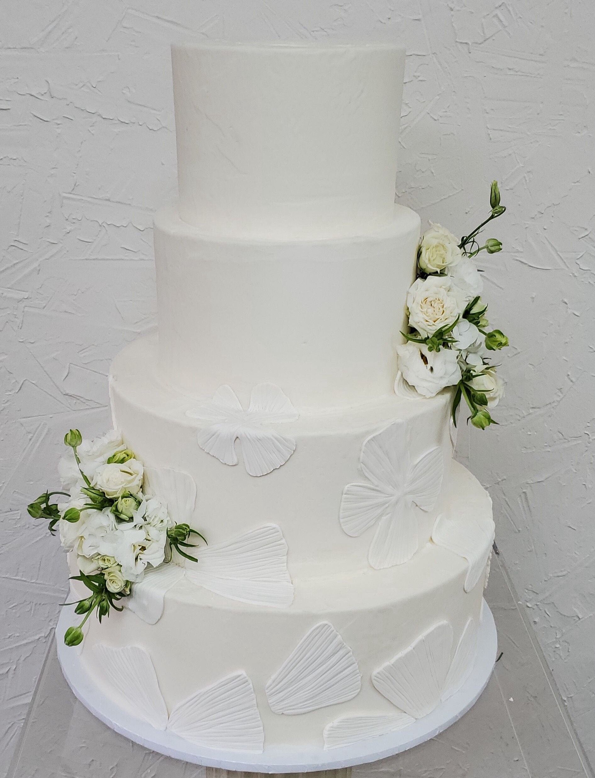 a wedding cake with flowers