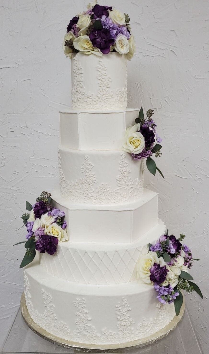 a wedding cake with flowers