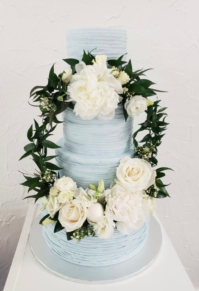a wedding cake with flowers