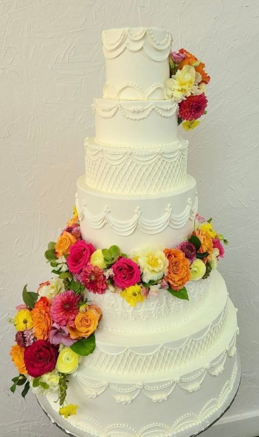 a wedding cake with flowers
