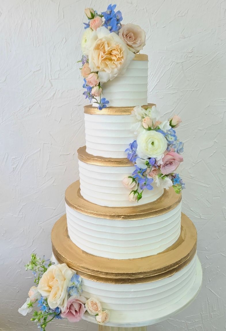 a wedding cake with flowers