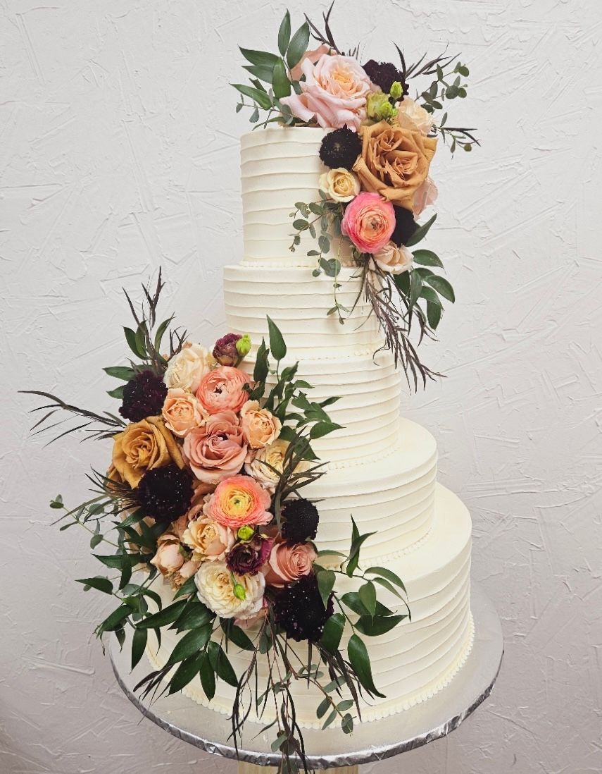 a wedding cake with flowers
