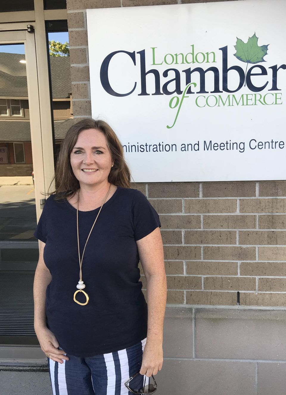 Nicole Laidler standing in front of the London Chamber of Commerce