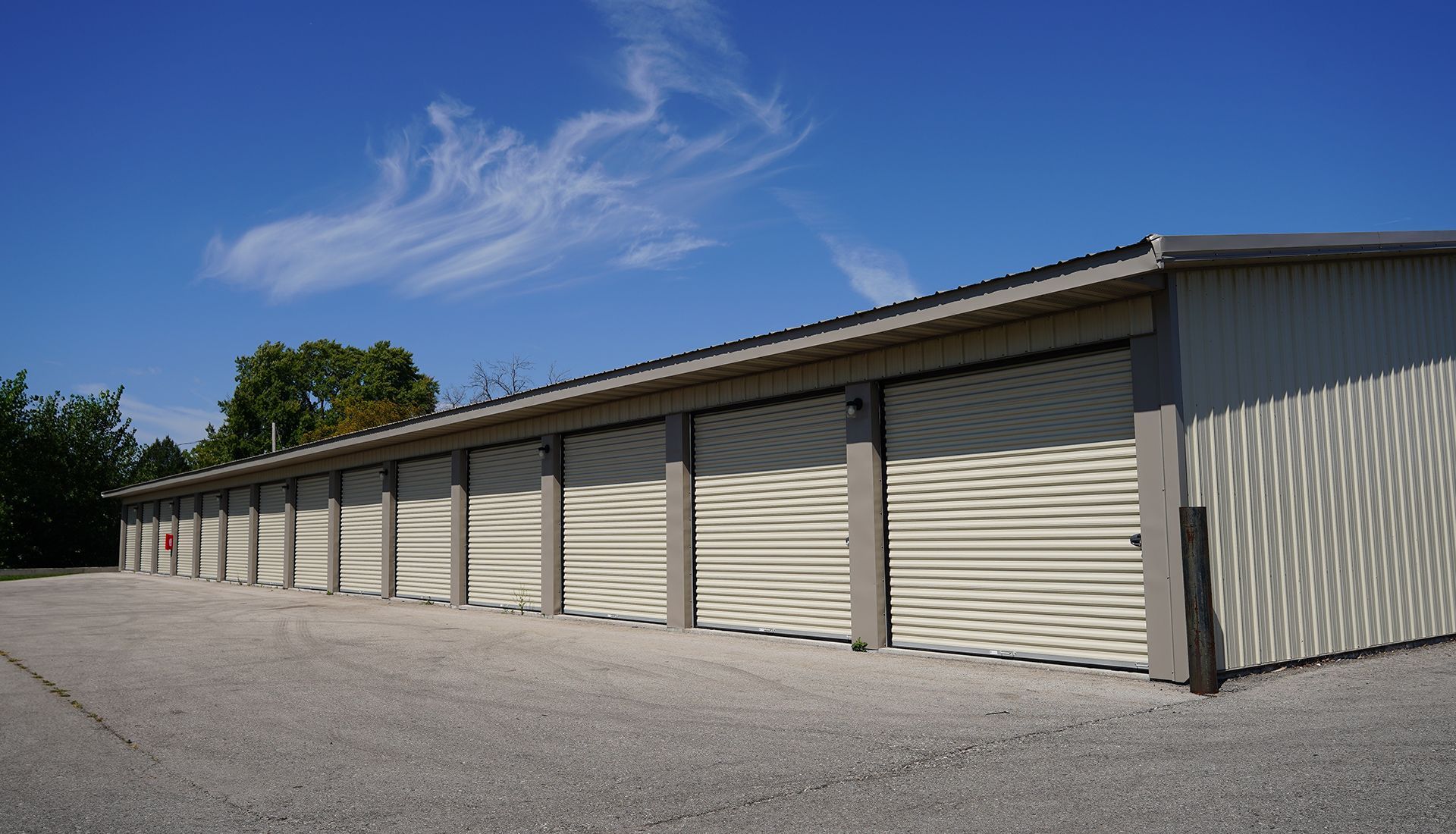 Room undergoing renovation with debris, ladder, and partially exposed wall.