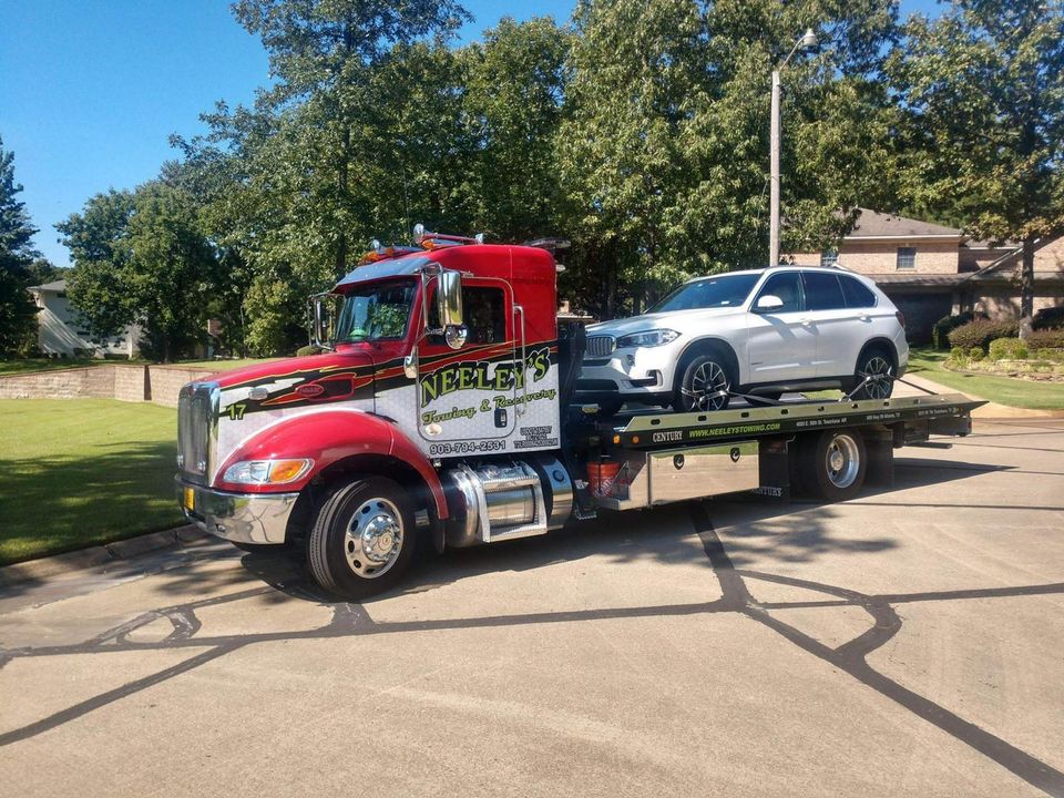 Towing a Black Auto — Texarkana, TX — Neeley's Service Center