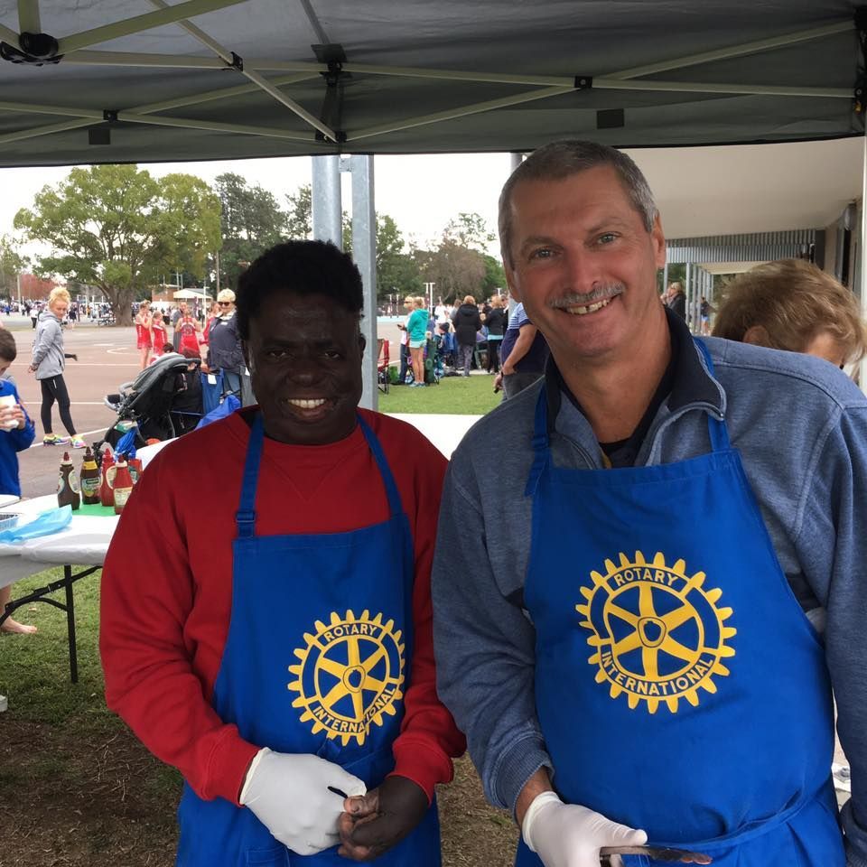 Two people wearing Rotary aprons — Accolades Awards Hunter Valley In Maitland, NSW