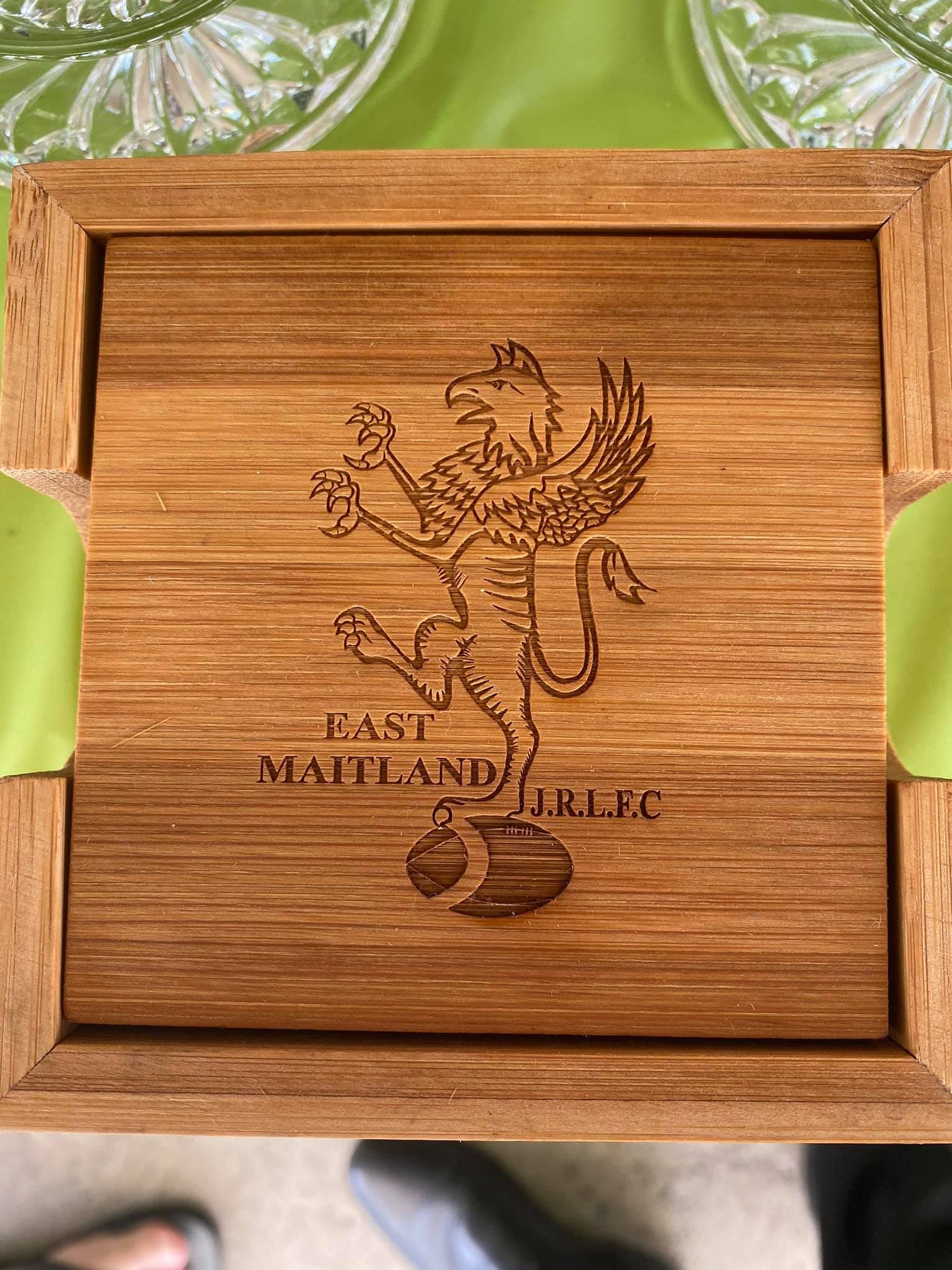 Wooden Coaster With A Lion On It On A Table — Accolades Awards Hunter Valley In Maitland, NSW