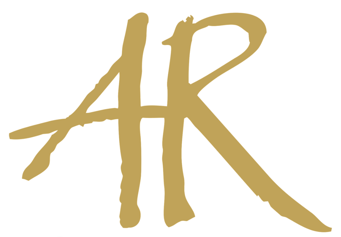 The letter ar is written in gold on a white background