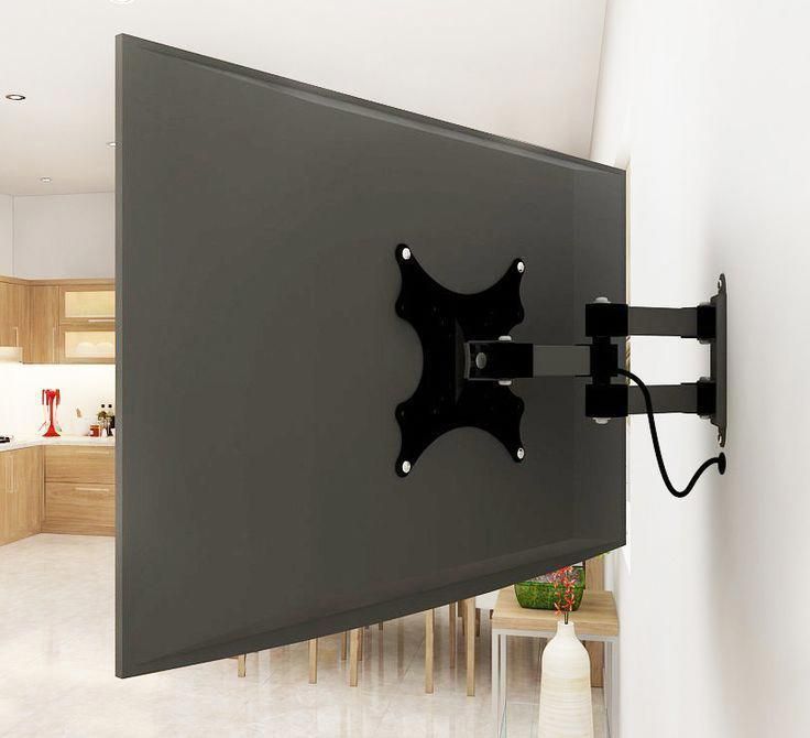 A flat screen tv mounted on a wall in a living room