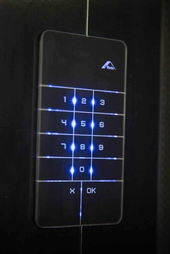 A close up of a keypad that says ' x ok ' on it