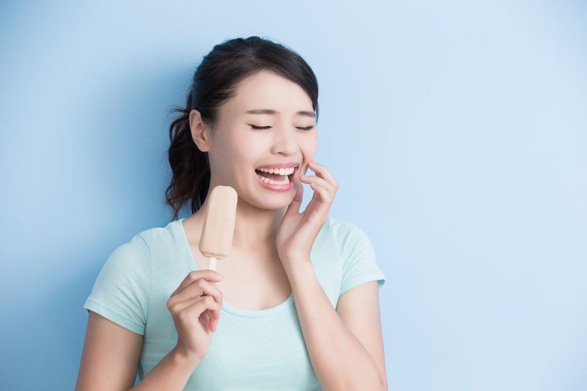 what causes sensitive teeth