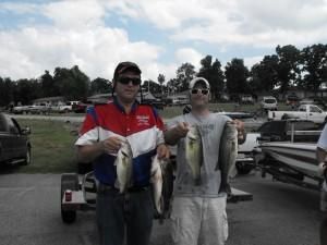 Two Men with Fish at the Parking | Auto Smart
