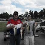 Two Men with Fish at a Parking Lot | Auto Smart