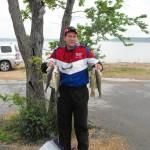 Man with Fish near Tree | Auto Smart