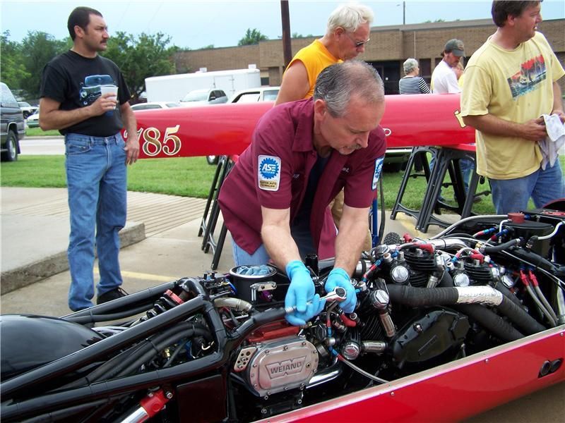 Man Repairing Red Car | Auto Smart