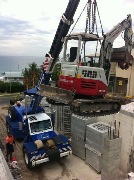 Crane Operating and Lifting an Electric Generator — Construction Service in Buderim, QLD