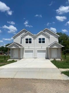 Image of white townhome