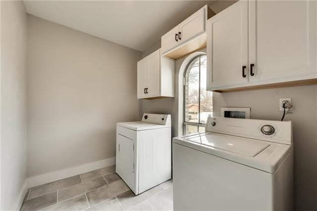 a bathroom with a toilet and a walk in shower