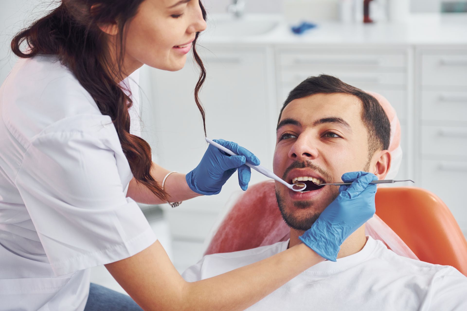 Man visiting dentist in clinic