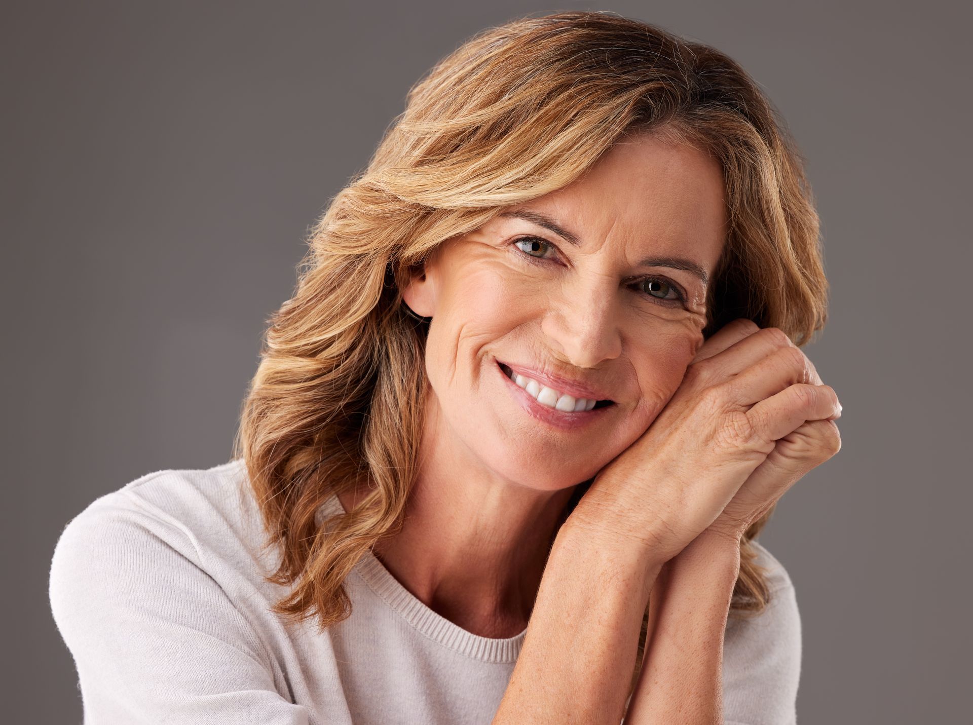 Confident smile after dental implant or denture treatment in Toowoomba